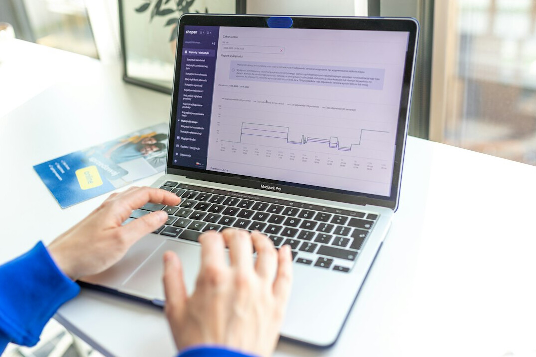 data analyst working on laptop